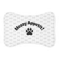 Messy Appetite bone-shaped pet feeding mat with paw and bone pattern